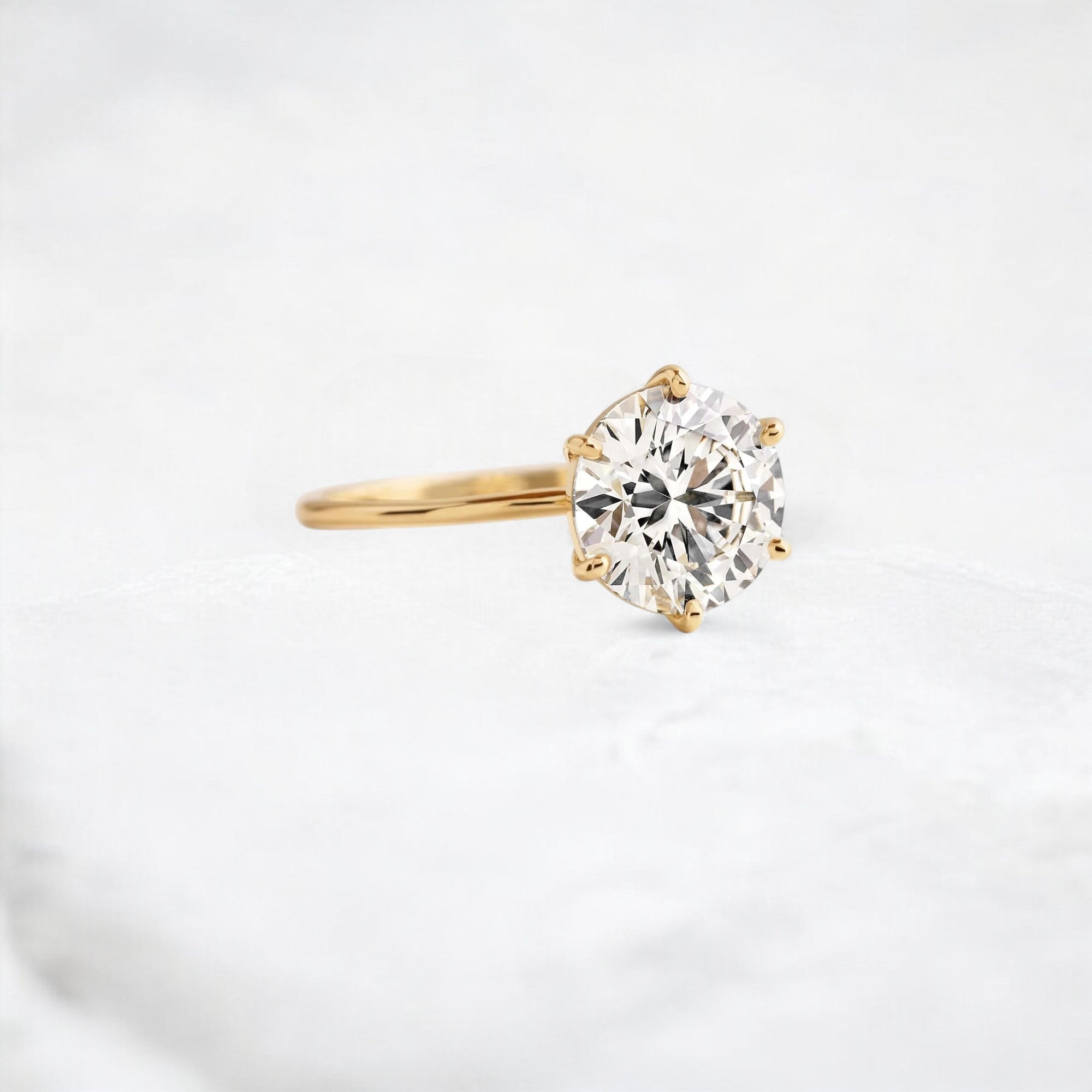 endless-love-round-moissanite-ring-in-golden-embrace-shine-2-4-ct-yellow-gold-gemfora-2
