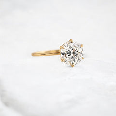 endless-love-round-moissanite-ring-in-golden-embrace-shine-2-4-ct-yellow-gold-gemfora-2