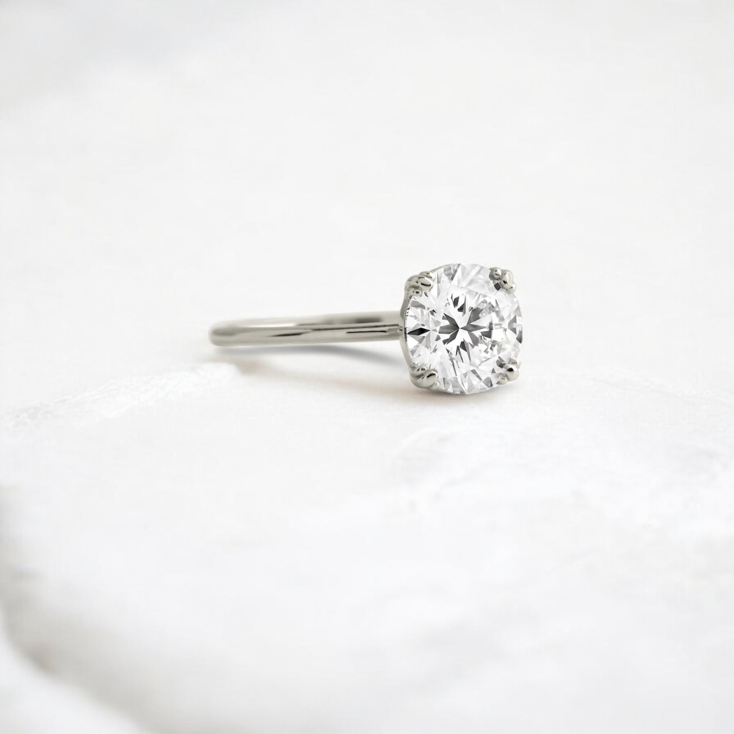 eternal-light-round-cut-moissanite-ring-4-prong-in-gold-shine-1-66-ct-platinum-gemfora-2