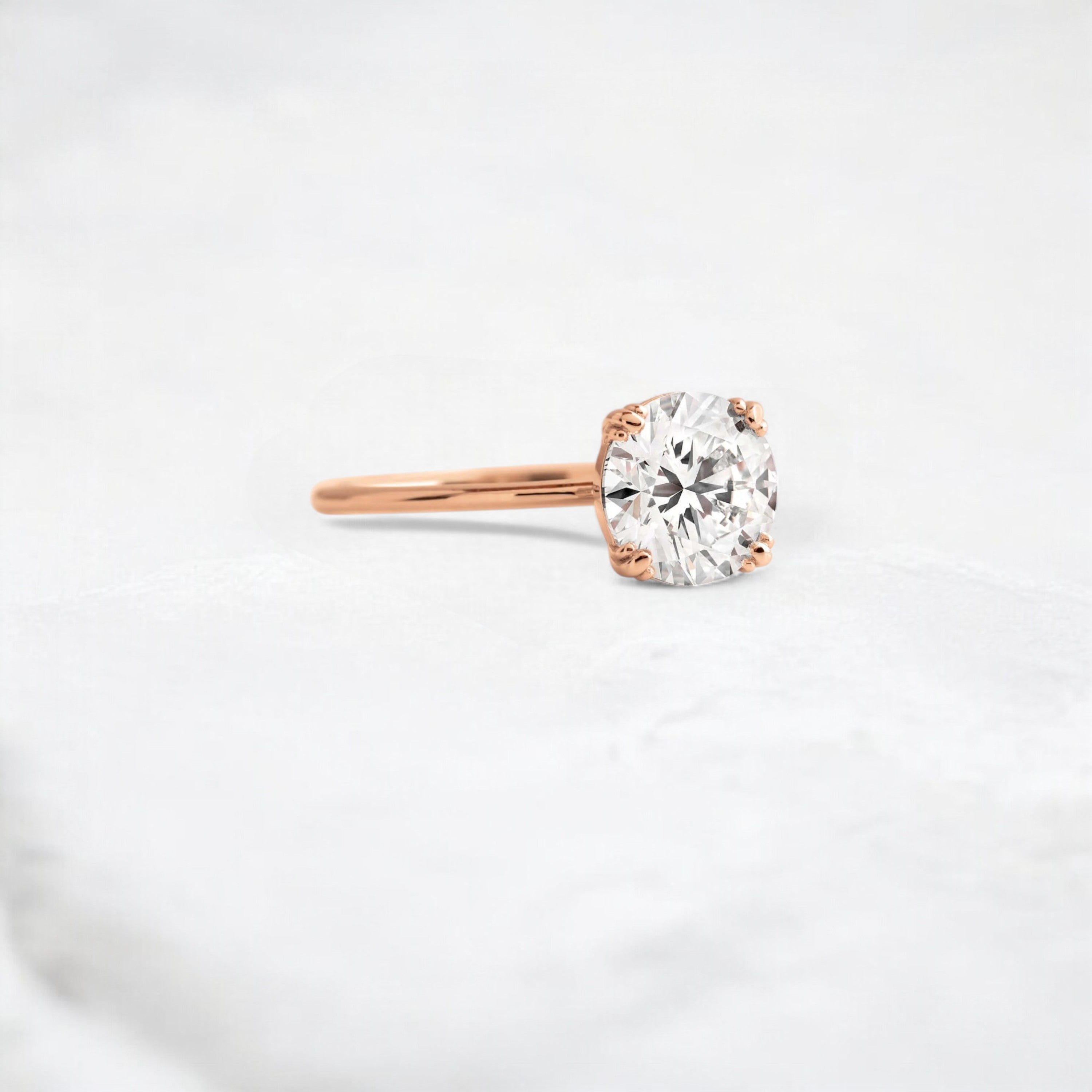 eternal-light-round-cut-moissanite-ring-4-prong-in-gold-shine-1-66-ct-rose-gemfora-2