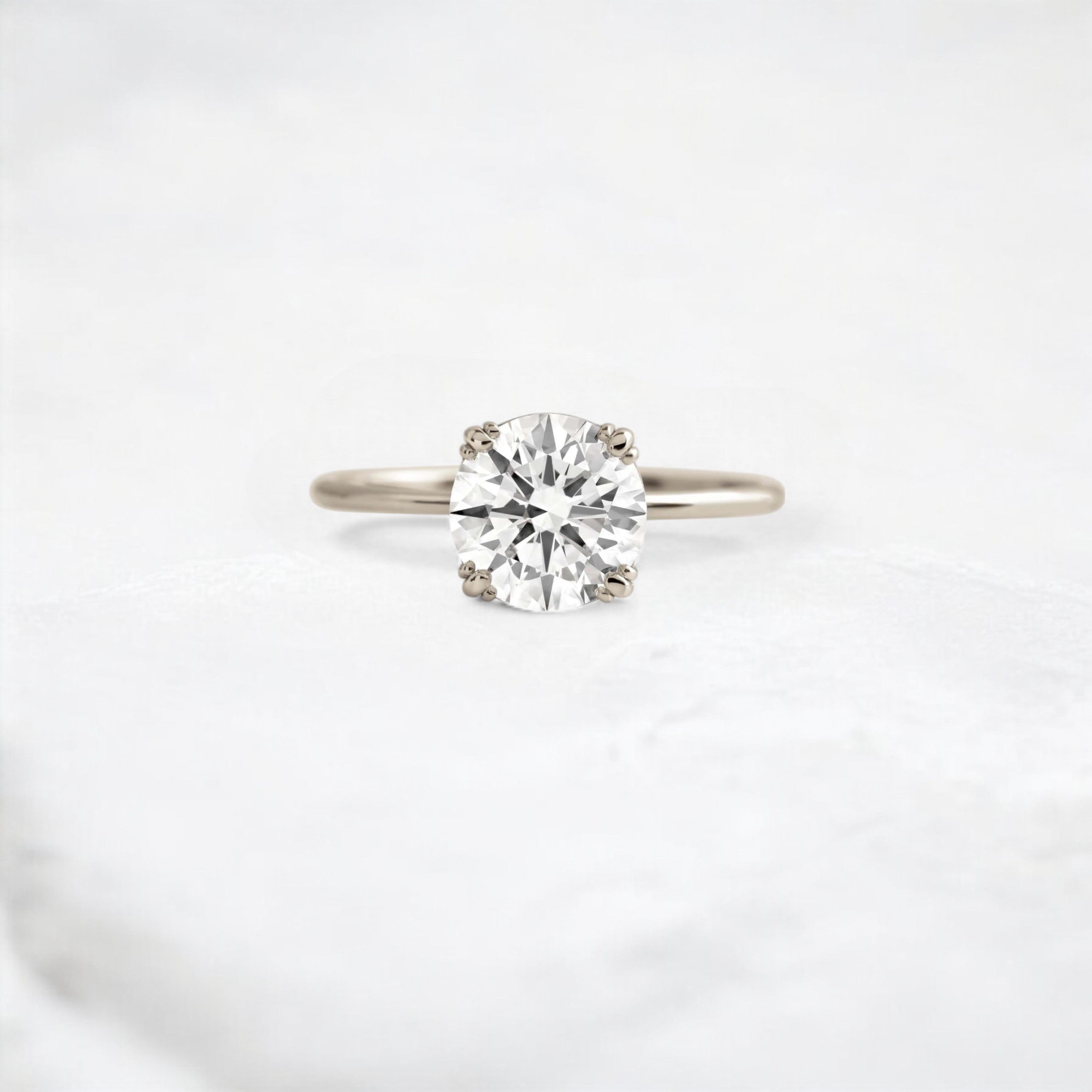 eternal-light-round-cut-moissanite-ring-4-prong-in-gold-shine-1-66-ct-white-gemfora-1