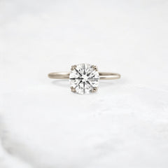 eternal-light-round-cut-moissanite-ring-4-prong-in-gold-shine-1-66-ct-white-gemfora-1