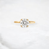 eternal-light-round-cut-moissanite-ring-4-prong-in-gold-shine-1-66-ct-yellow-gemfora-1