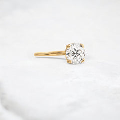 eternal-light-round-cut-moissanite-ring-4-prong-in-gold-shine-1-66-ct-yellow-gemfora-2