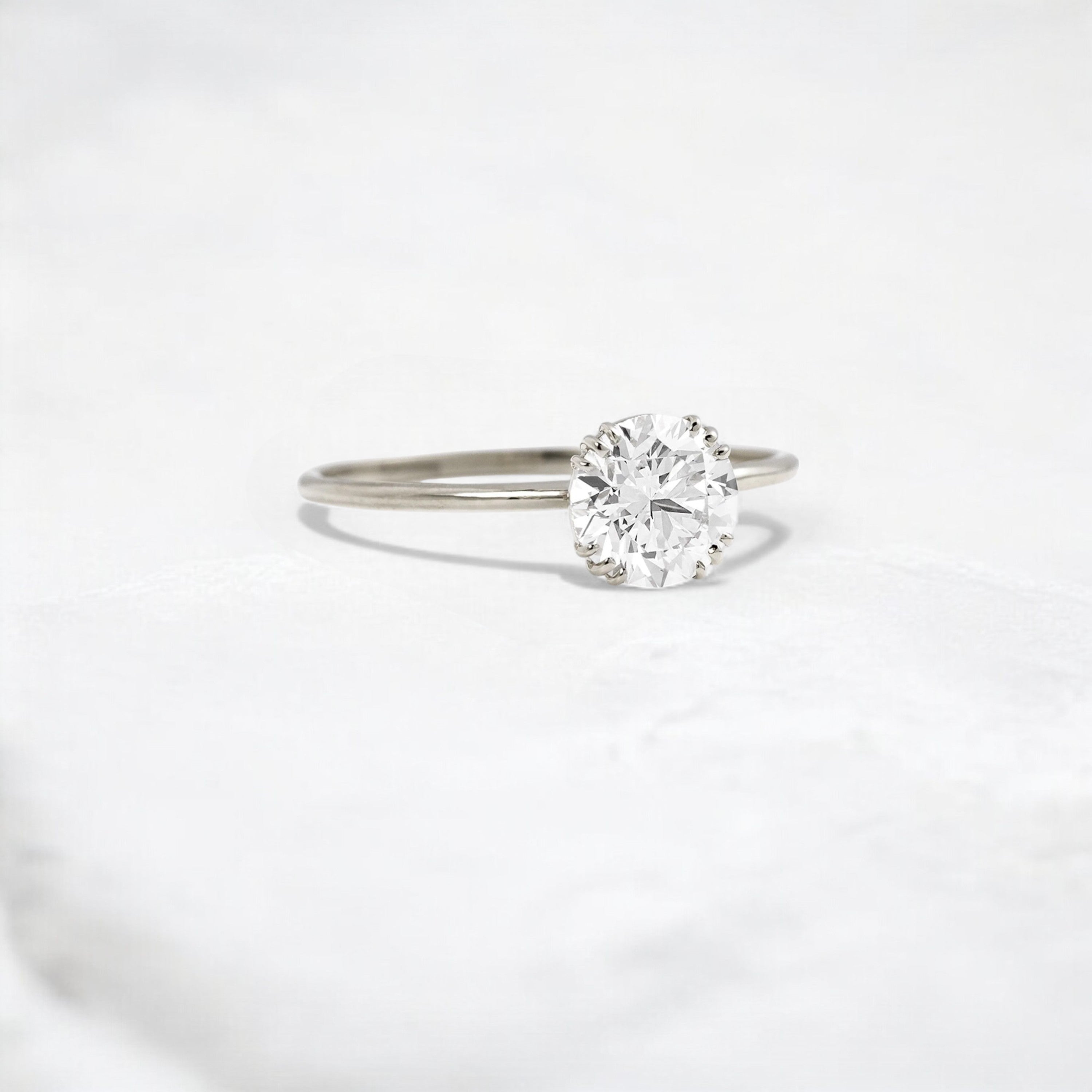 eternal-light-round-cut-moissanite-ring-4-prong-in-gold-shine-1-ct-platinum-gemfora-2