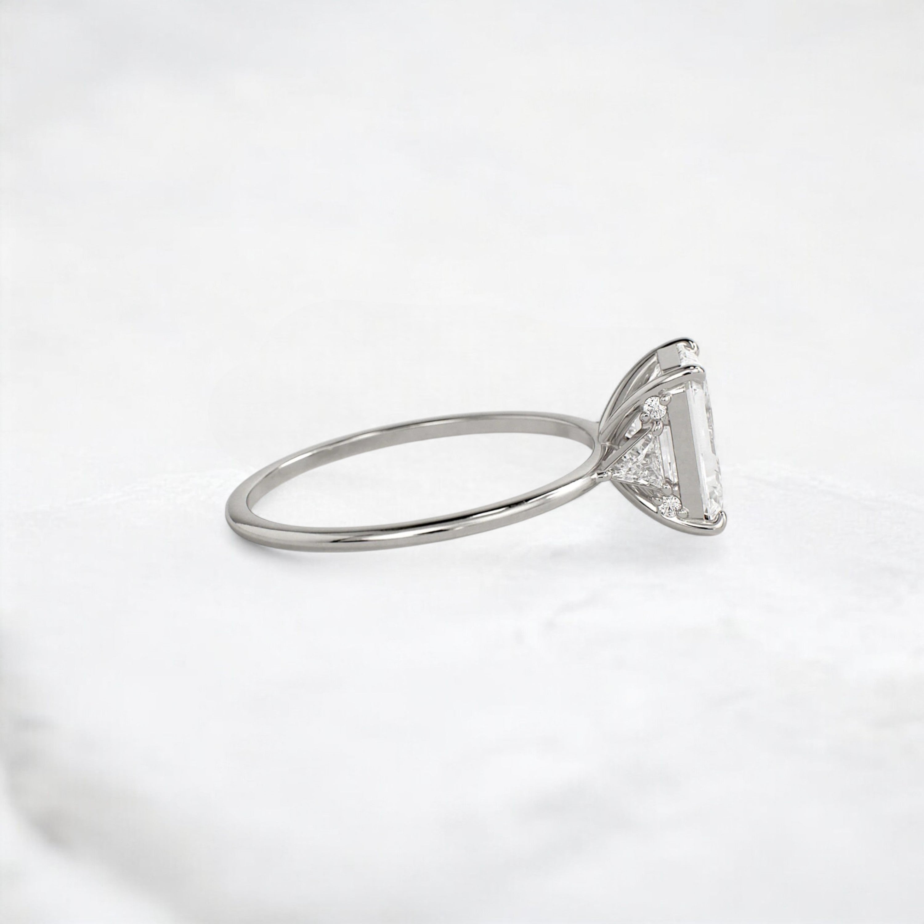 ethereal-flame-emerald-three-stone-moissanite-engagement-ring-2-ct-platinum-gemfora-3