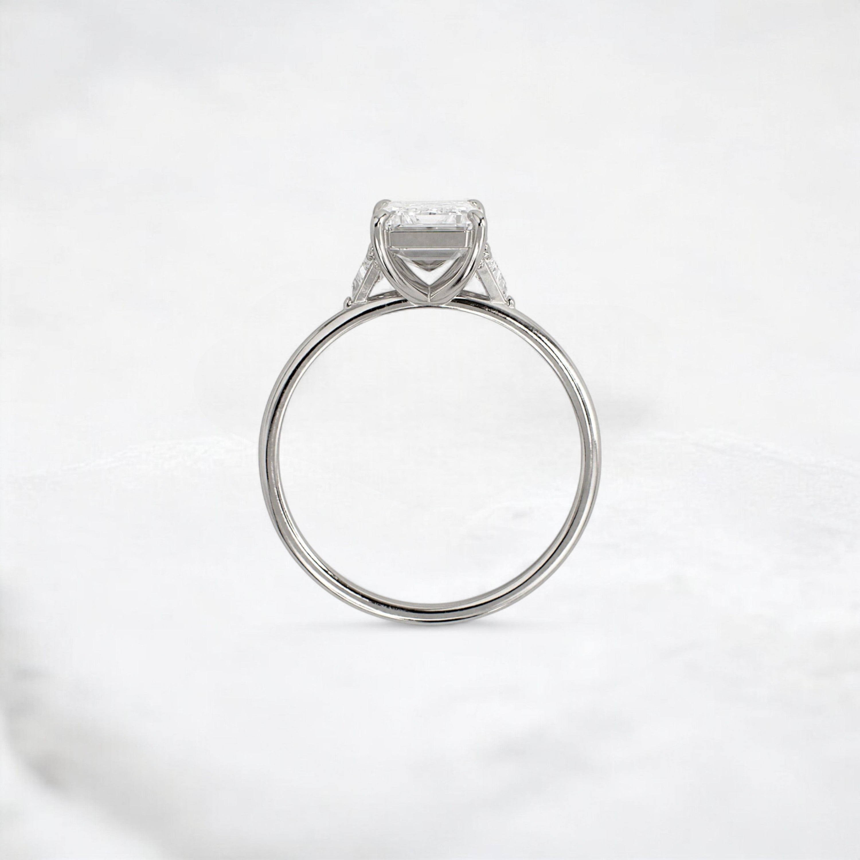 ethereal-flame-emerald-three-stone-moissanite-engagement-ring-2-ct-platinum-gemfora-4