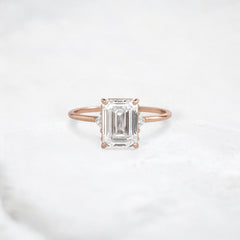 ethereal-flame-emerald-three-stone-moissanite-engagement-ring-2-ct-rose-gold-gemfora-1