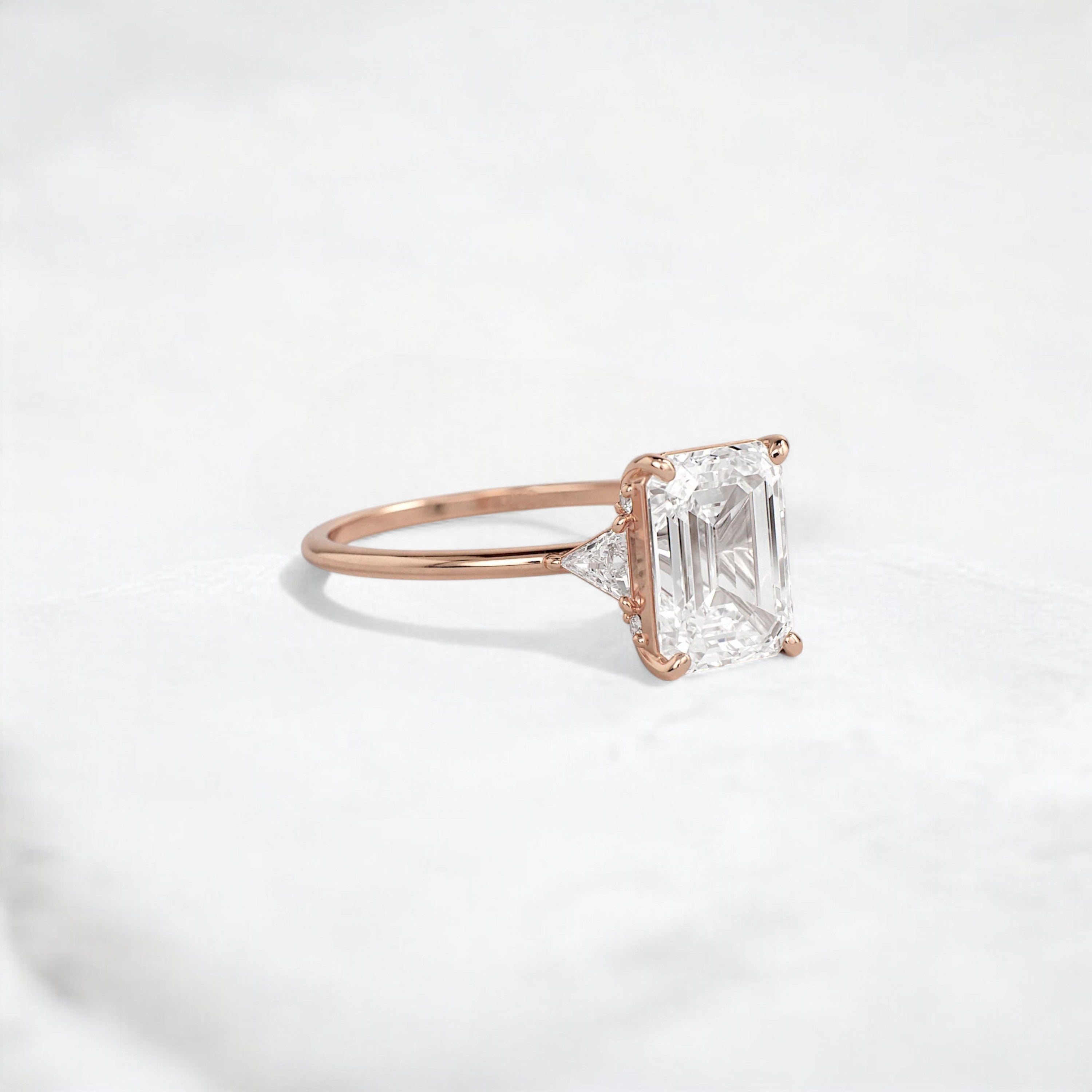 ethereal-flame-emerald-three-stone-moissanite-engagement-ring-2-ct-rose-gold-gemfora-2