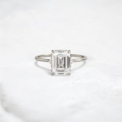 ethereal-flame-emerald-three-stone-moissanite-engagement-ring-2-ct-white-gold-gemfora-1