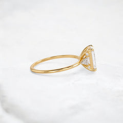 ethereal-flame-emerald-three-stone-moissanite-engagement-ring-2-ct-yellow-gemfora-3