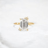 flameleaf-embrace-emerald-spark-moissanite-engagement-ring-3-ct-yellow-gold-gemfora-1