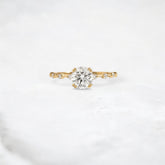 golden-bloom-round-cut-pave-moissanite-engagement-ring-1-ct-yellow-gold-gemfora-1