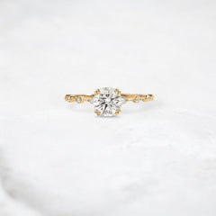 golden-bloom-round-cut-pave-moissanite-engagement-ring-1-ct-yellow-gold-gemfora-1