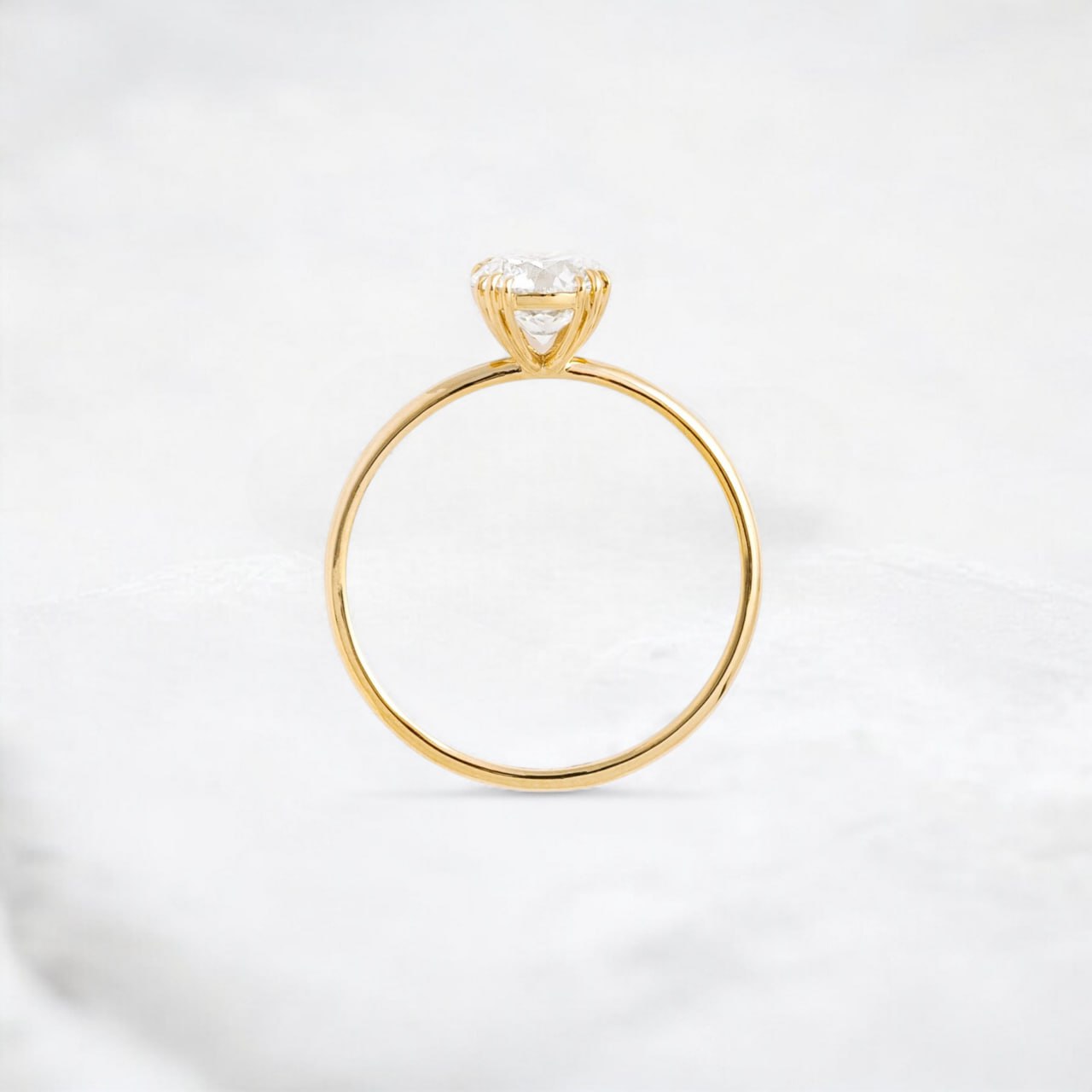 golden-dawn-round-cut-heartbeat-moissanite-engagement-ring-1-ct-yellow-gold-gemfora-3