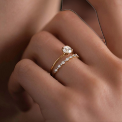 golden-dawn-round-cut-heartbeat-moissanite-engagement-ring-model-gemfora-2