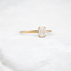 golden-lumen-emerald-solitaire-moissanite-engagement-ring-0-70-ct-yellow-gold-gemfora-2