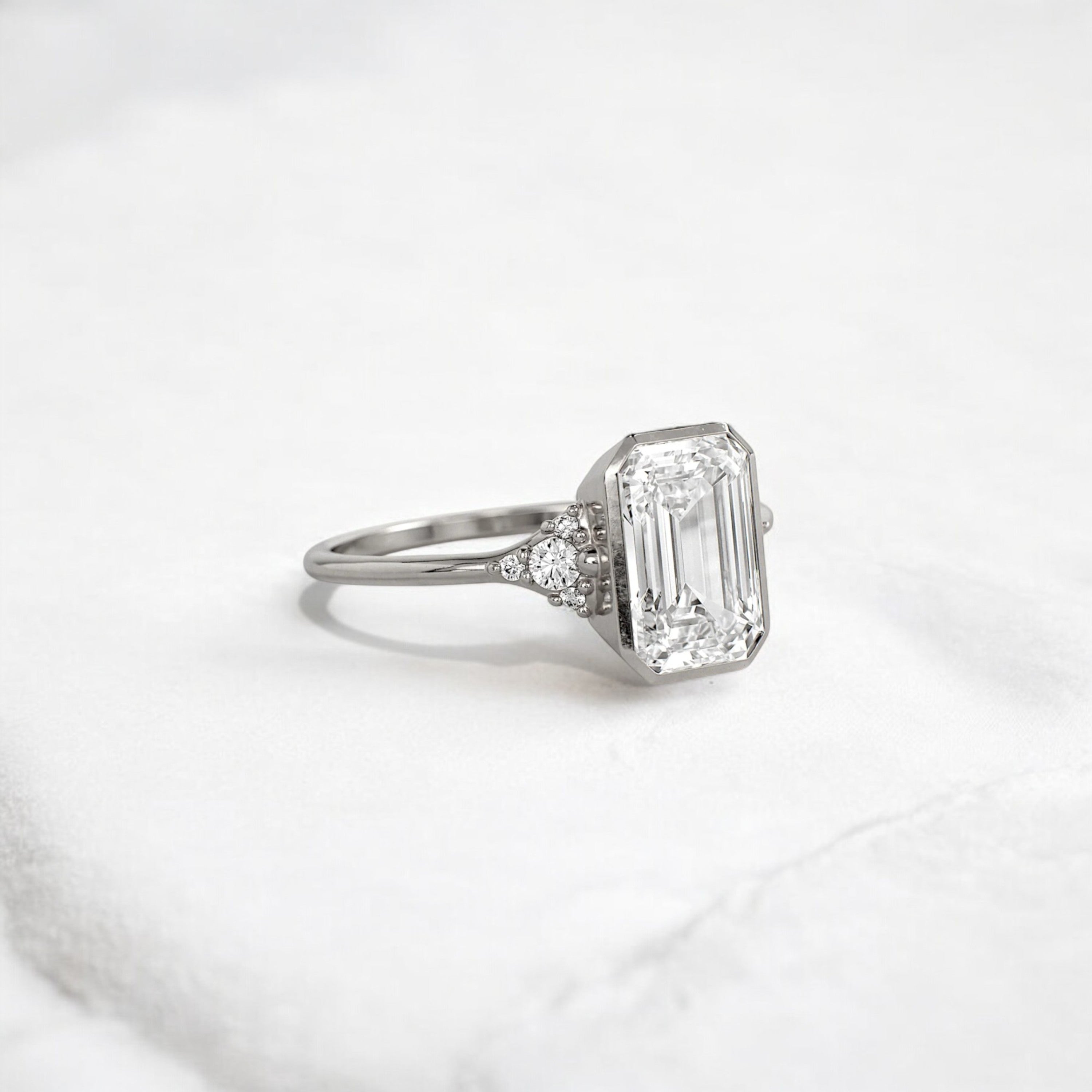 Luxury bezel handmade Cluster emerald cut engagement ring