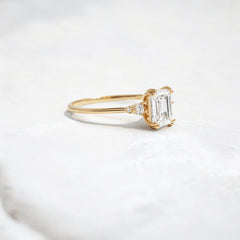 handmade-cluster-emerald-double-prong-moissanite-engagement-ring-1-01-yellow-gold-gemfora-2