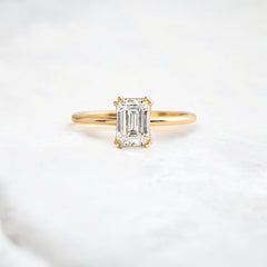 handmade-double-prong-emerald-solitaire-moissanite-engagement-ring-0-90-ct-yellow-gold-gemfora