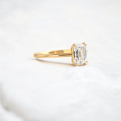 handmade-double-prong-emerald-solitaire-moissanite-engagement-ring-0-90-ct-yellow-gold-gemfora