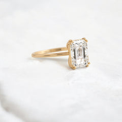 handmade-double-prong-emerald-solitaire-moissanite-engagement-ring-1-70-ct-yellow-gold-gemfora