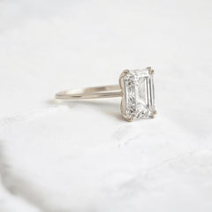 handmade-double-prong-emerald-solitaire-moissanite-engagement-ring-3-05-ct-white-gold-gemfora