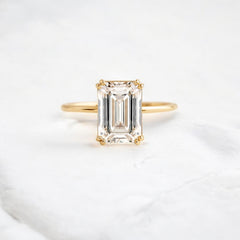 handmade-double-prong-emerald-solitaire-moissanite-engagement-ring-3-05-ct-yellow-gold-gemfora