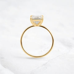 handmade-double-prong-emerald-solitaire-moissanite-engagement-ring-3-05-ct-yellow-gold-gemfora