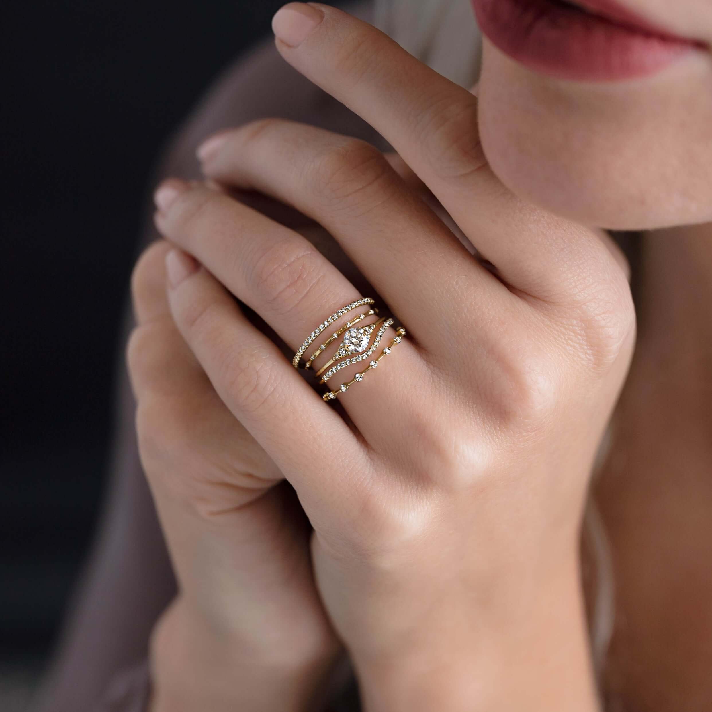 handmade-round-cut-0.4ct-moissanite-engagement-ring-with-closed-basket-and-two-tab-prongs-yellow-gold-gemfora-1