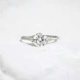handmade-round-cut-1.14ct-moissanite-engagement-ring-with-closed-basket-and-two-tab-prongs-platinum-gemfora-1