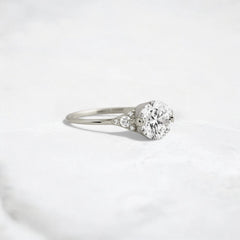 handmade-round-cut-1.14ct-moissanite-engagement-ring-with-closed-basket-and-two-tab-prongs-platinum-gemfora-2