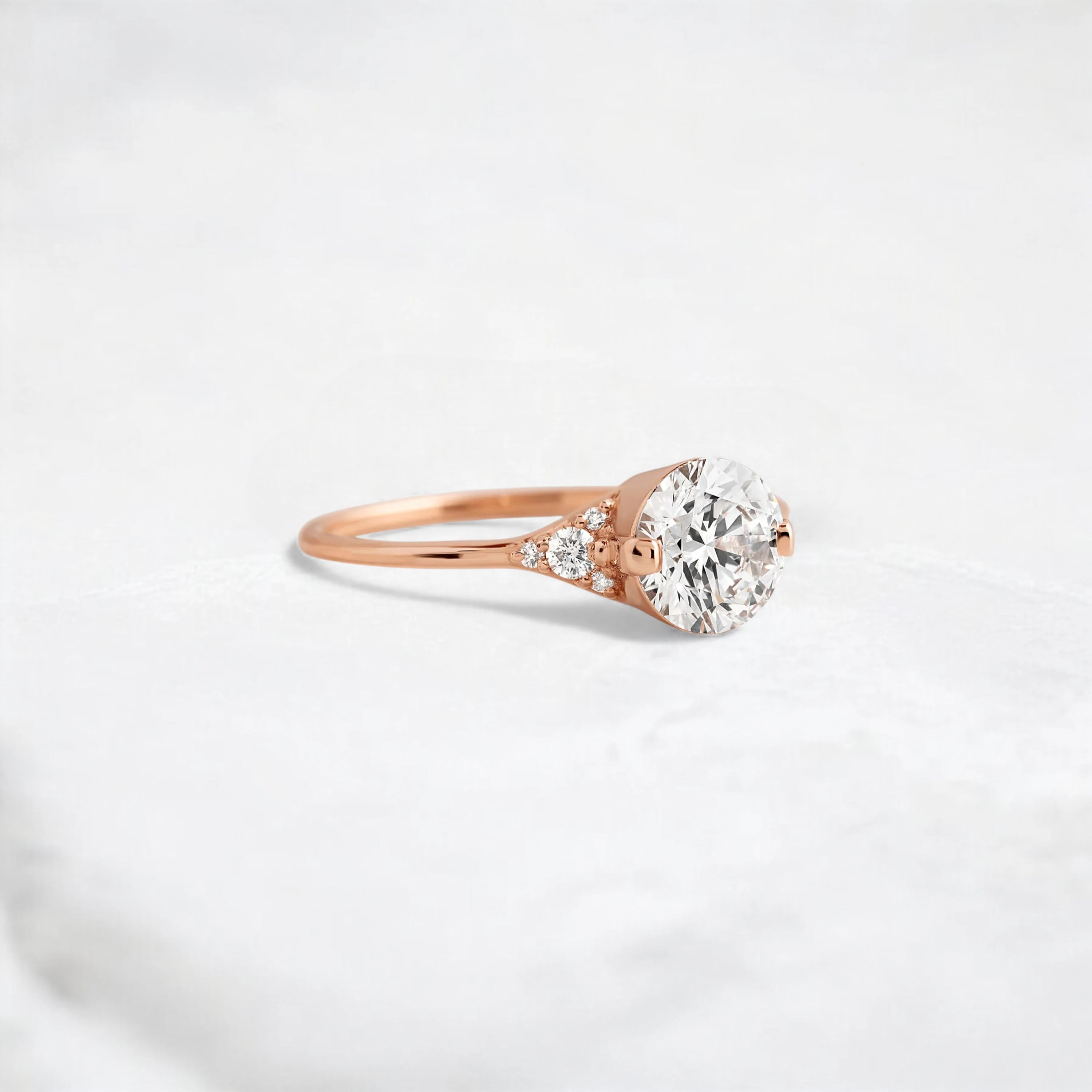 handmade-round-cut-1.14ct-moissanite-engagement-ring-with-closed-basket-and-two-tab-prongs-rose-gold-gemfora-2