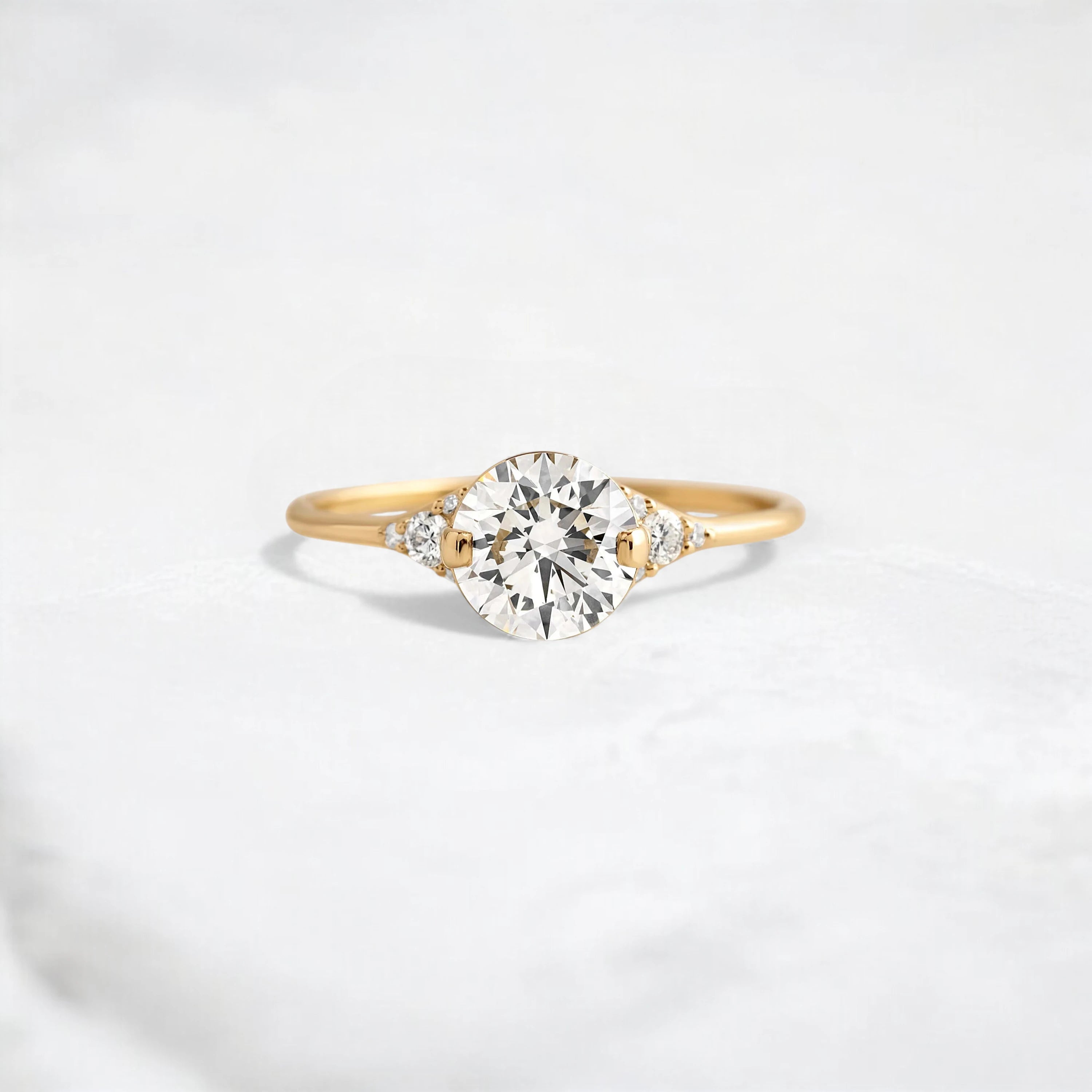 handmade-round-cut-1.14ct-moissanite-engagement-ring-with-closed-basket-and-two-tab-prongs-yellow-gold-gemfora-1