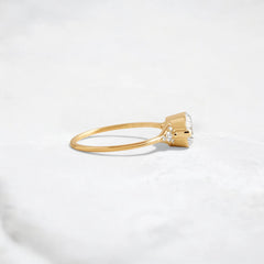 handmade-round-cut-1.14ct-moissanite-engagement-ring-with-closed-basket-and-two-tab-prongs-yellow-gold-gemfora-3