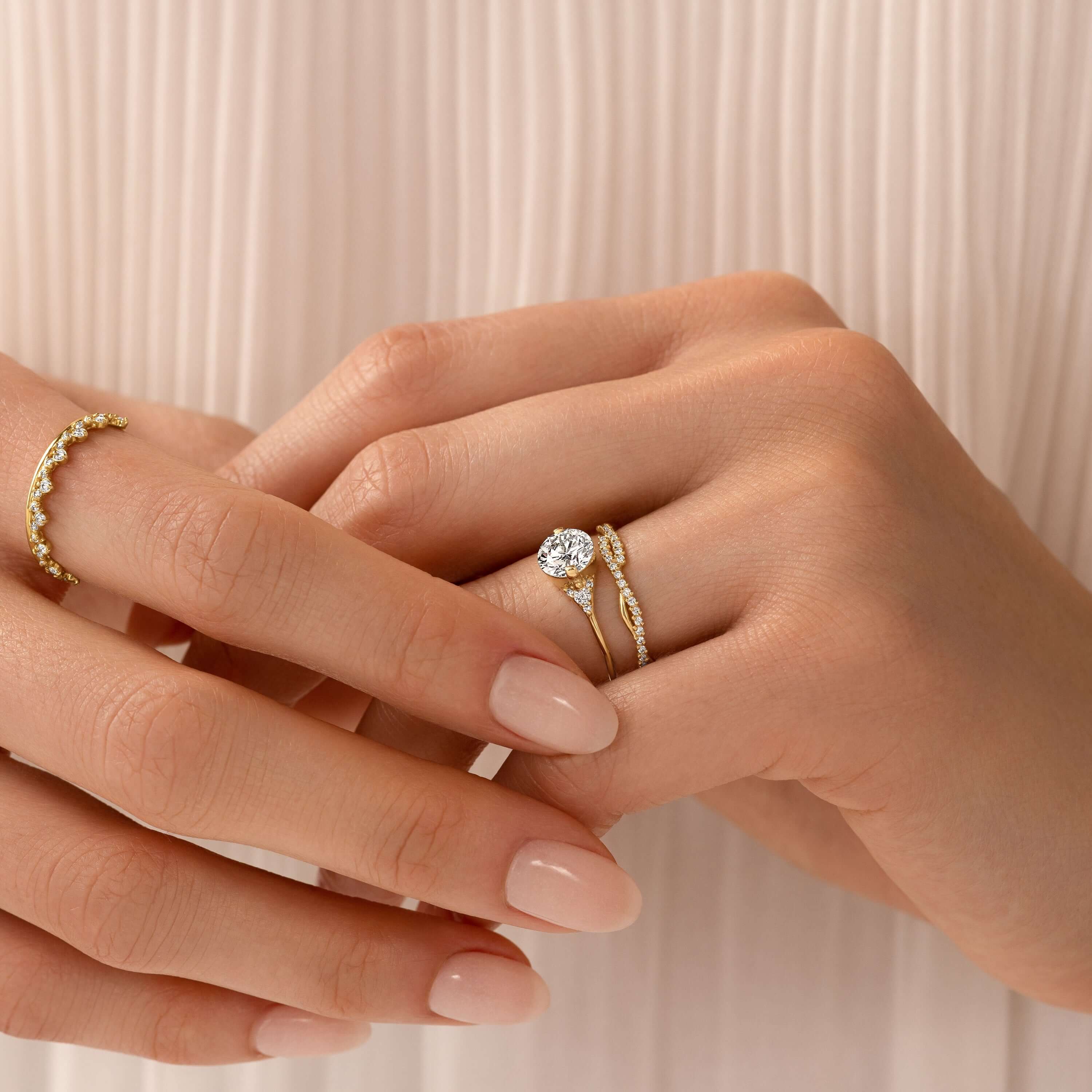 handmade-round-cut-1.14ct-moissanite-engagement-ring-with-closed-basket-and-two-tab-prongs-yellow-gold-gemfora-7