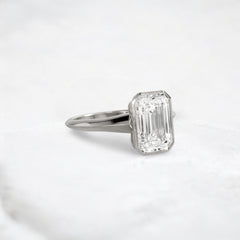 hidden-muse-emerald-glow-bezel-moissanite-engagement-ring-3-ct-platinum-gemfora-2