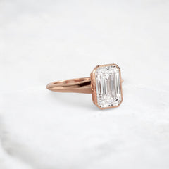 hidden-muse-emerald-glow-bezel-moissanite-engagement-ring-3-ct-rose-gold-gemfora-2