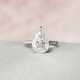 Pear Cut Hidden Halo 5.0CT Lab-Grown Three Side Pave Engagement Ring