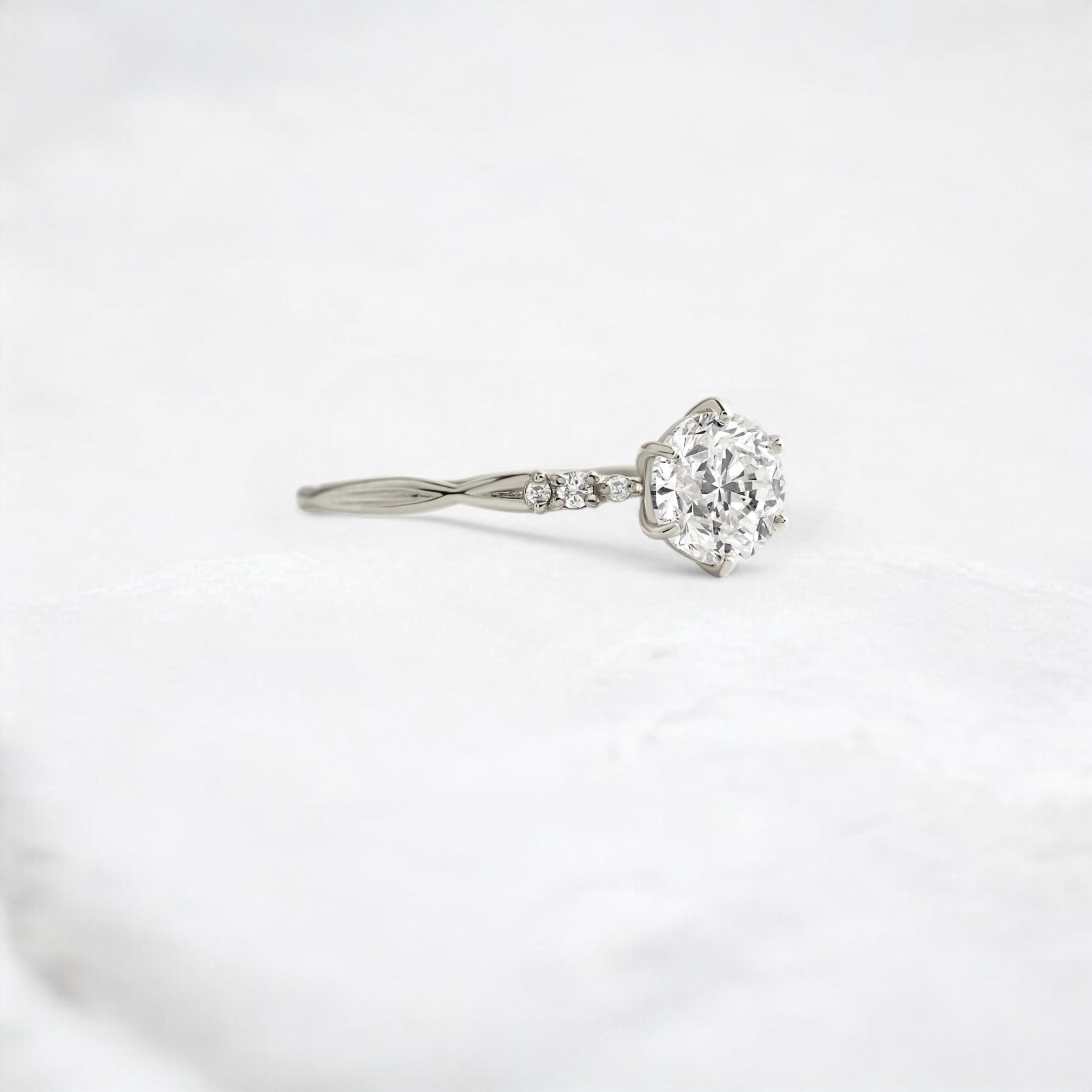 infinite-shine-round-curved-love-moissanite-engagement-ring-0-9-ct-platinum-gemfora-2