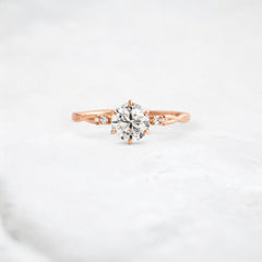 infinite-shine-round-curved-love-moissanite-engagement-ring-0-9-ct-rose-gold-gemfora-1