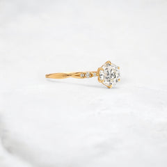 infinite-shine-round-curved-love-moissanite-engagement-ring-0-9-ct-yellow-gold-gemfora-2