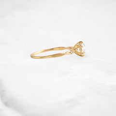 infinite-shine-round-curved-love-moissanite-engagement-ring-0-9-ct-yellow-gold-gemfora-3