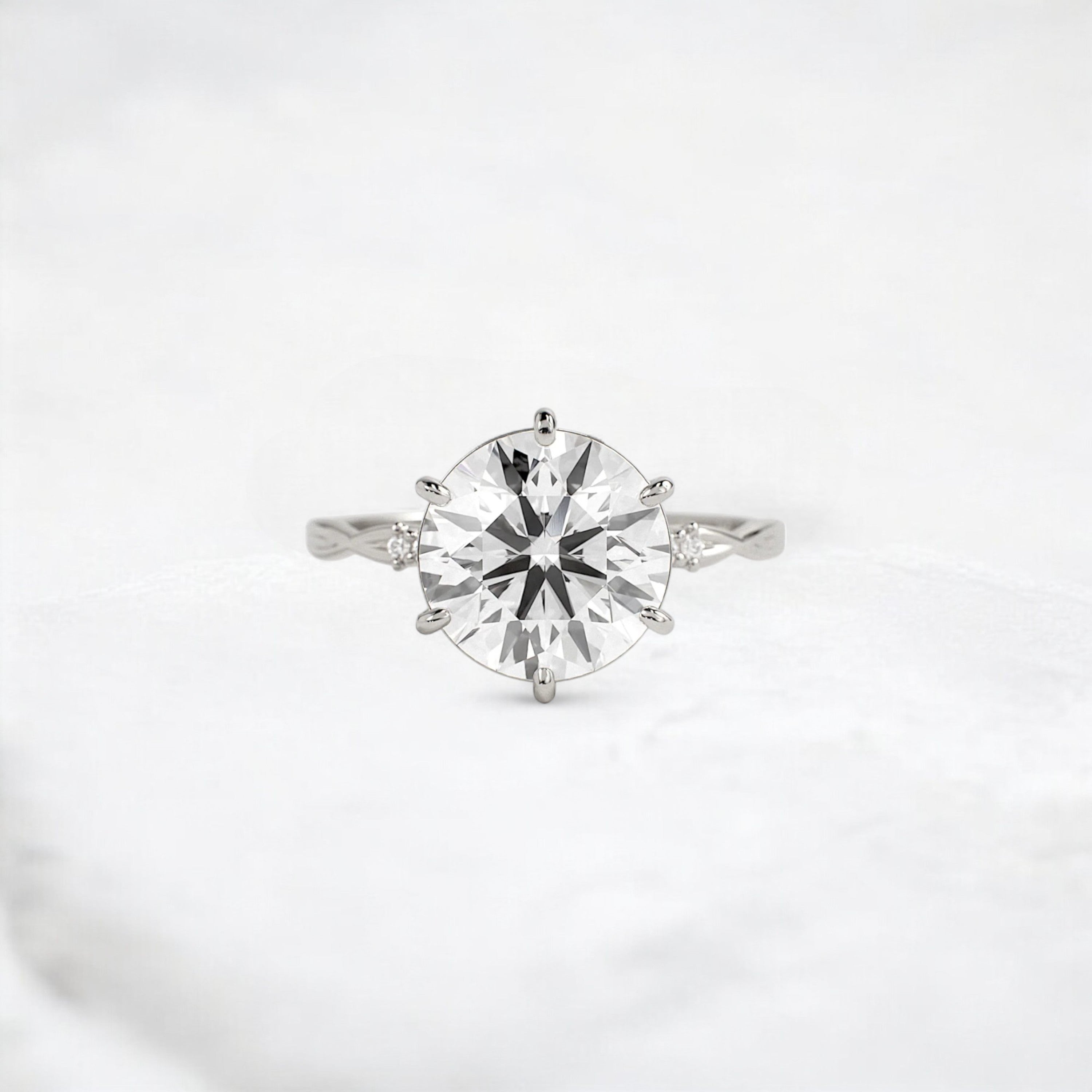 infinite-shine-round-curved-love-moissanite-engagement-ring-3-ct-platinum-gemfora-1
