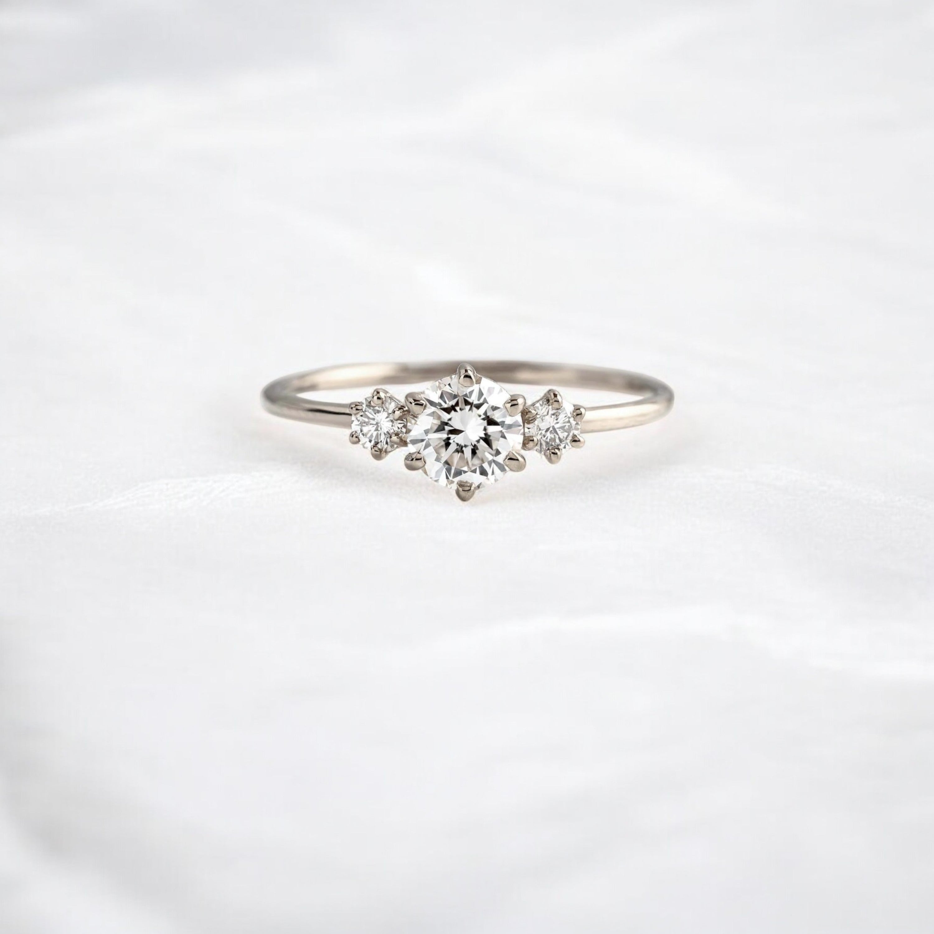 luna-light-round-sparkle-moissanite-engagement-ring-0-5-ct-white-gold-gemfora-1
