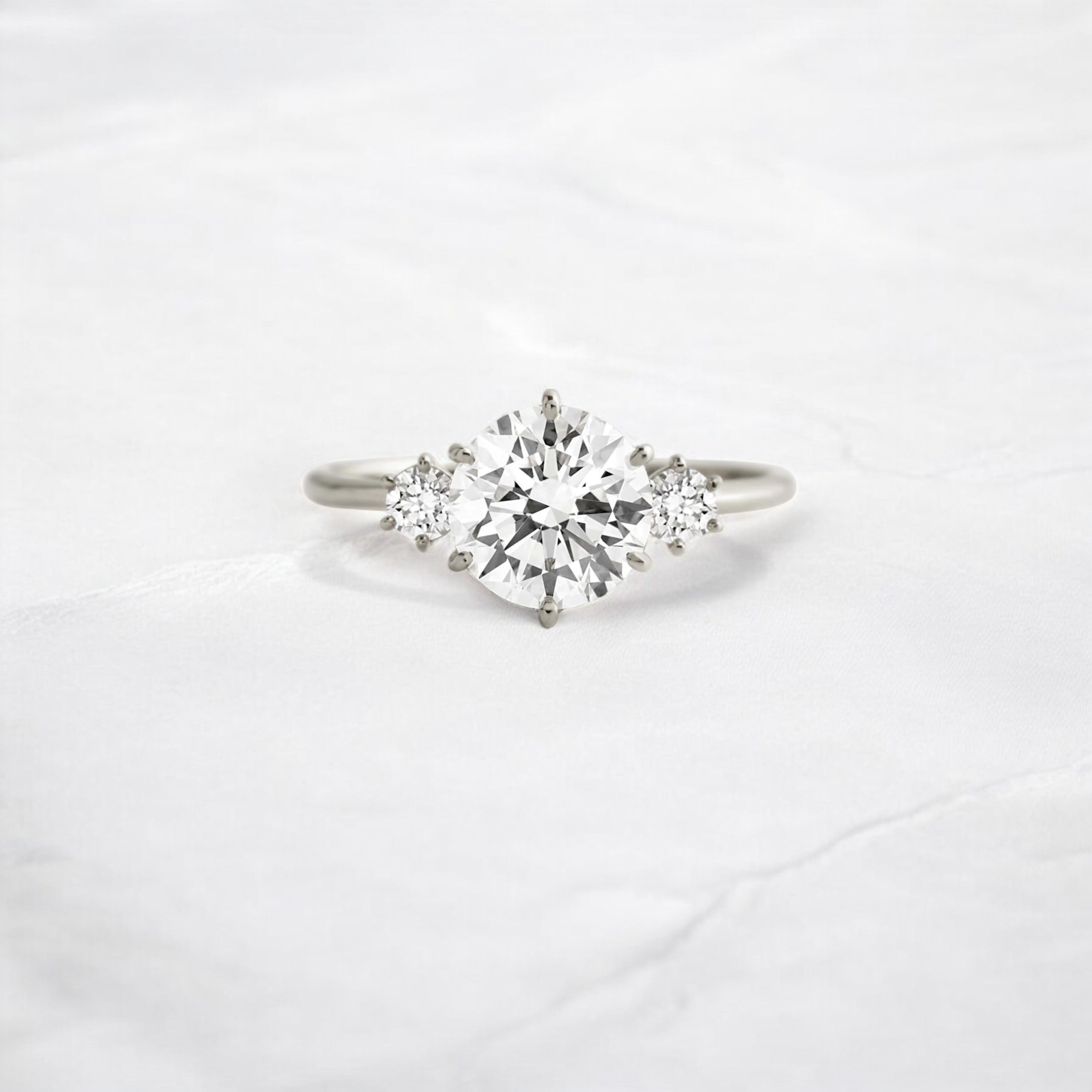 luna-light-round-sparkle-moissanite-engagement-ring-1-16-ct-platinum-gemfora-1