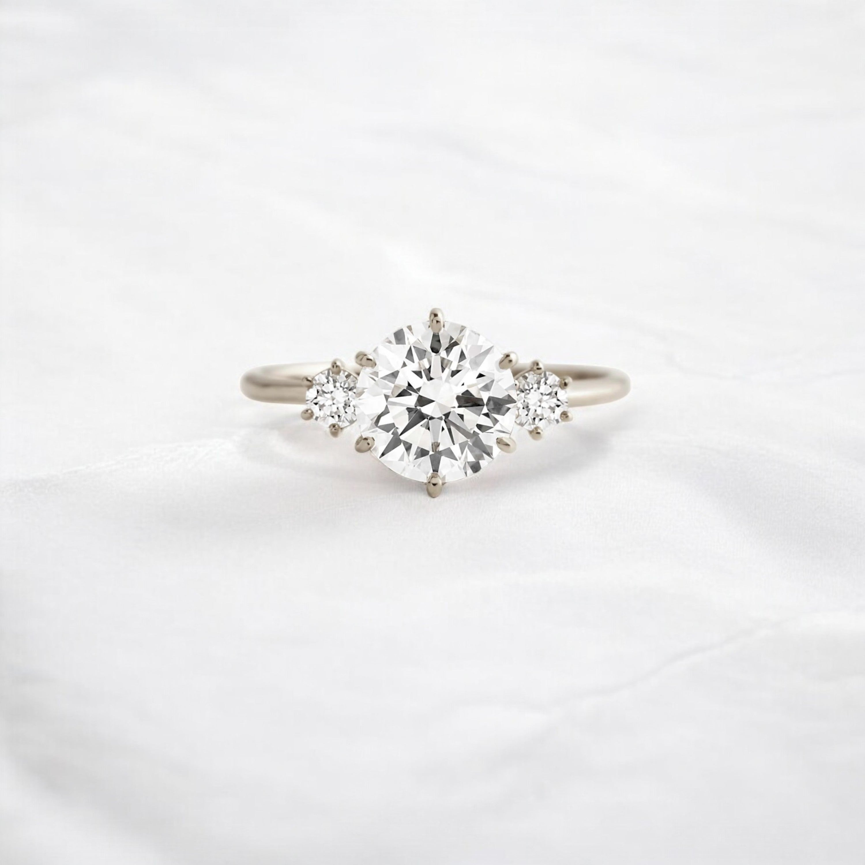 luna-light-round-sparkle-moissanite-engagement-ring-1-16-ct-white-gold-gemfora-1