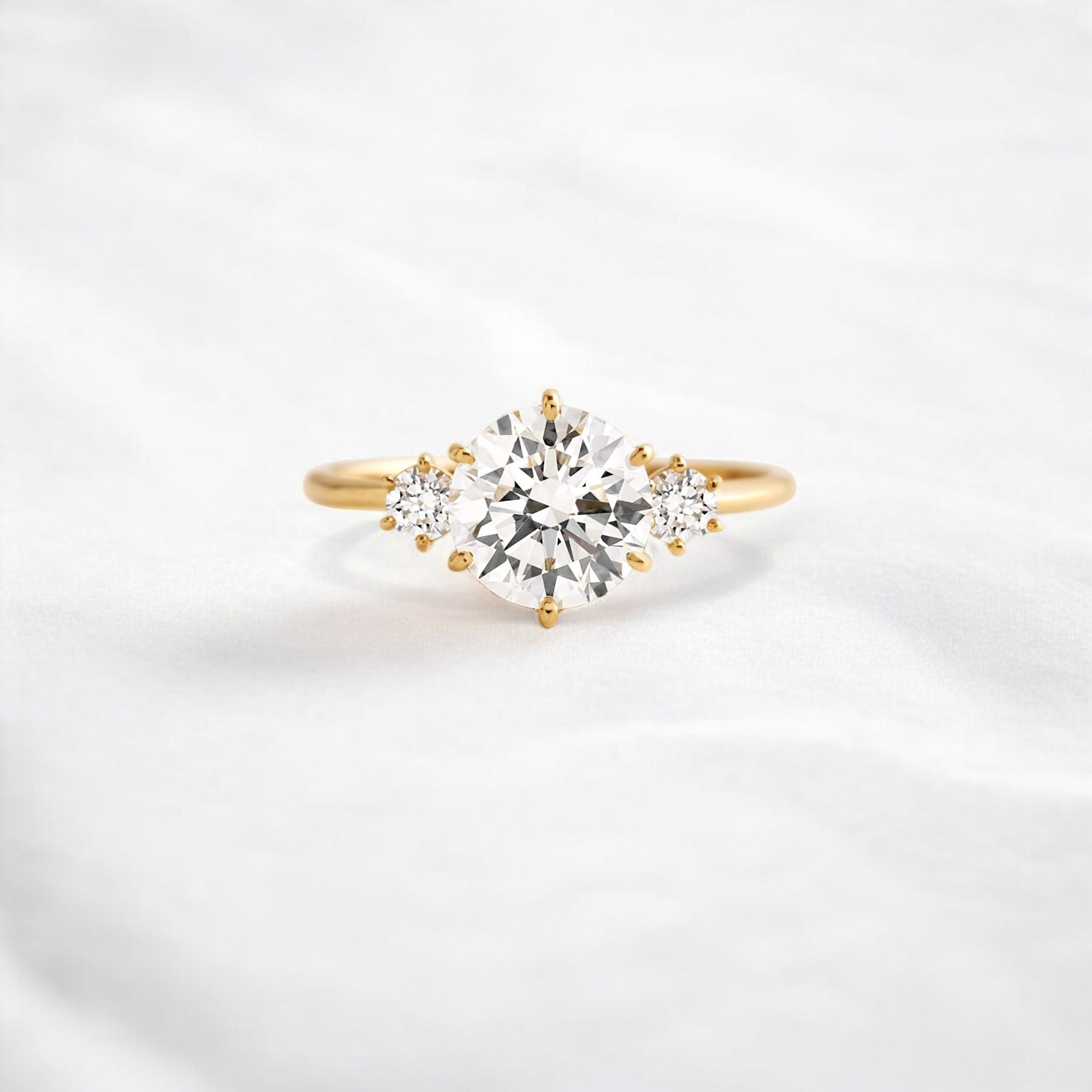 luna-light-round-sparkle-moissanite-engagement-ring-1-16-ct-yellow-gold-gemfora-1