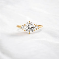 luna-light-round-sparkle-moissanite-engagement-ring-1-16-ct-yellow-gold-gemfora-1