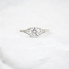 Morning Light, Bloom Petal Round Moissanite Engagement Ring